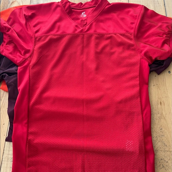 Bundle of practice football gear.  4 practice jerseys, 4 black socks & chinstrap - Picture 5 of 7